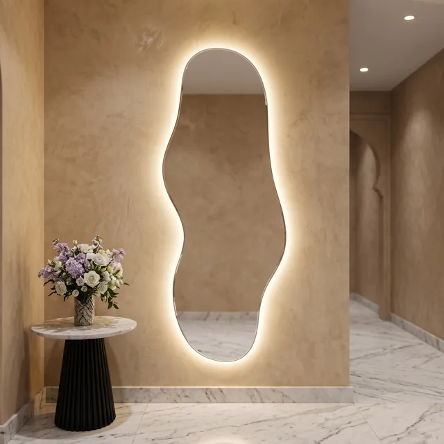 Miroir Dune LED dans une entrée en marbre et tadelakt